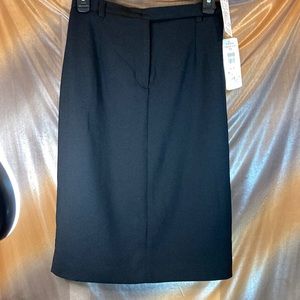 Vintage 90’s black pencil skirt. Virtual society by Haggar. 26” waist Box F